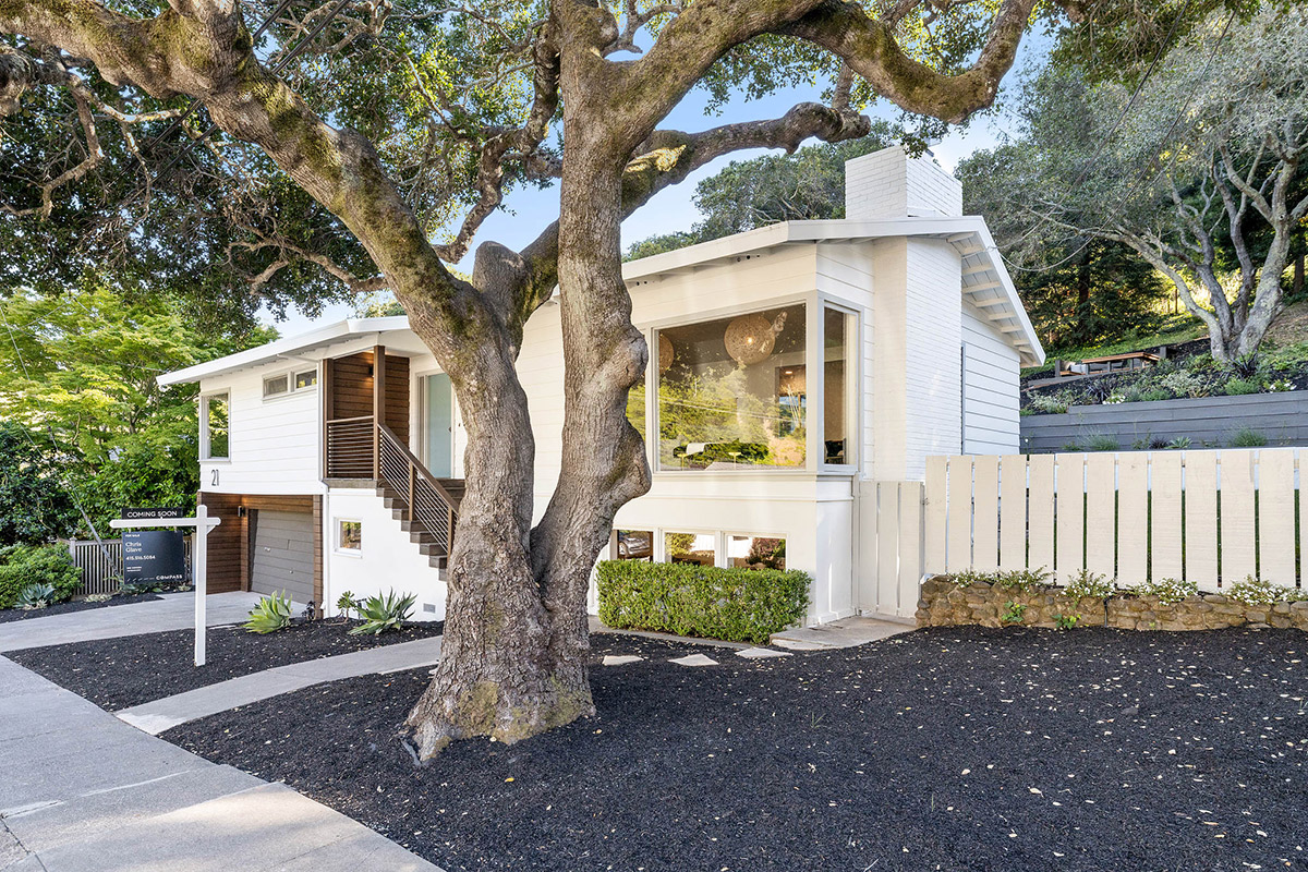 Exterior view of 21 Convent Ct, showing the new landscaping and fresh paint on the facade