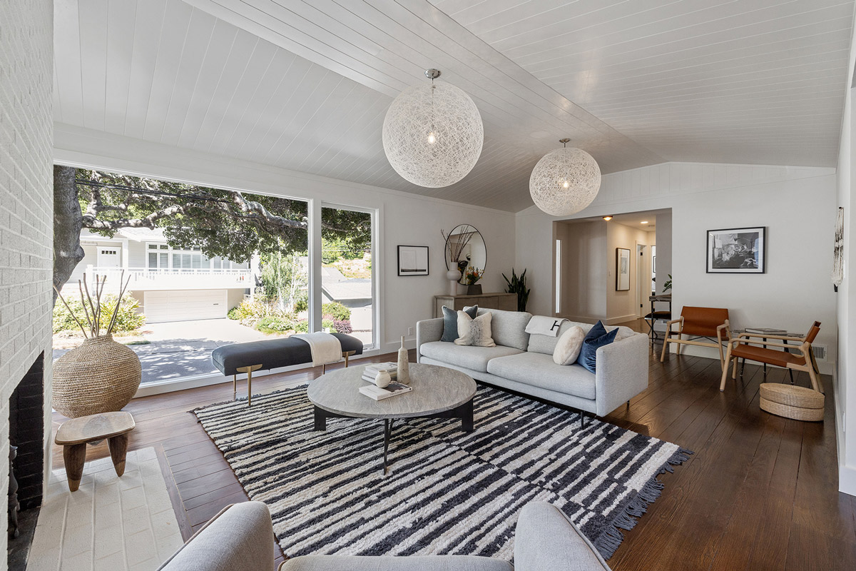 View of the primary living area with newly refinished floors